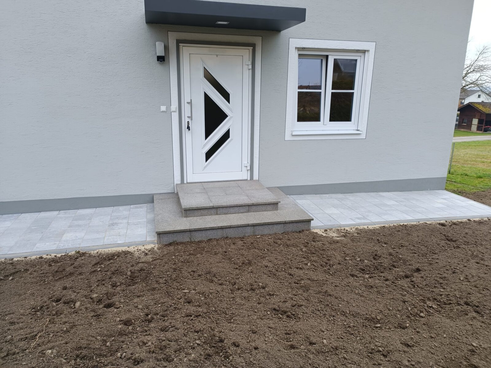Pflaster um Haustüre